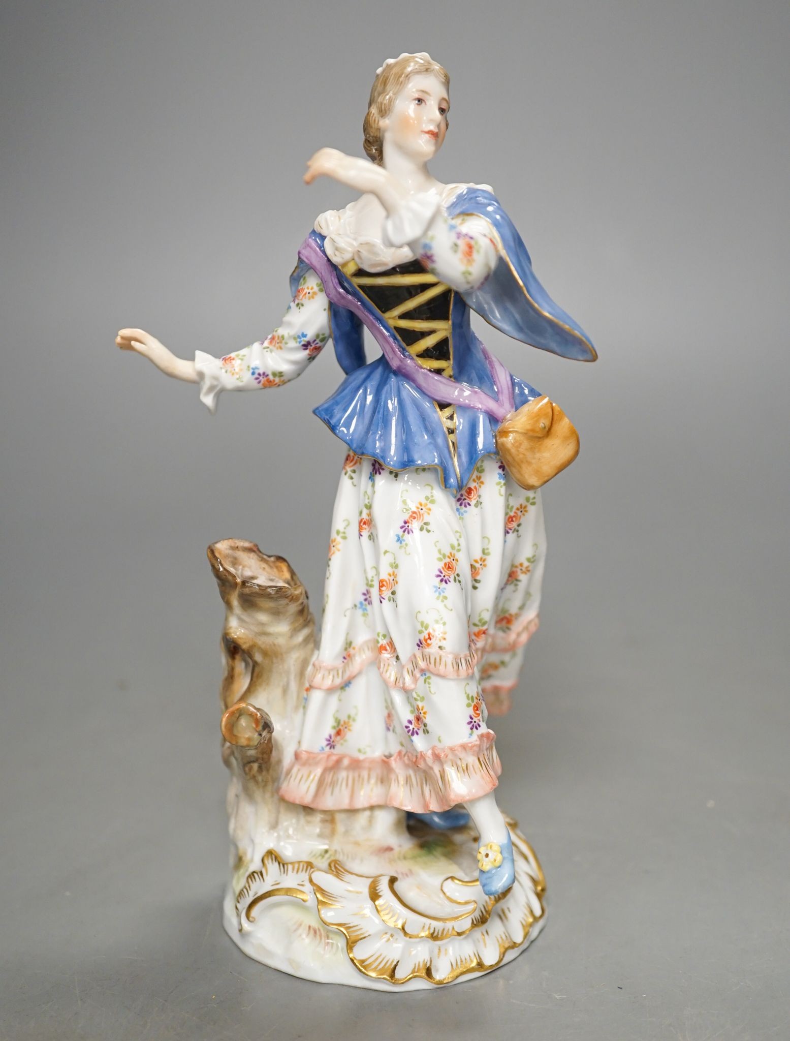 A Meissen figure of a lady, incised model 1984. 18cm tall